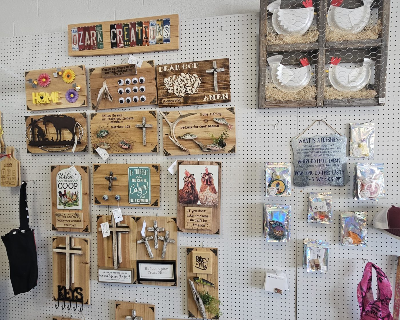 Farmhouse-style decor signs and wreaths