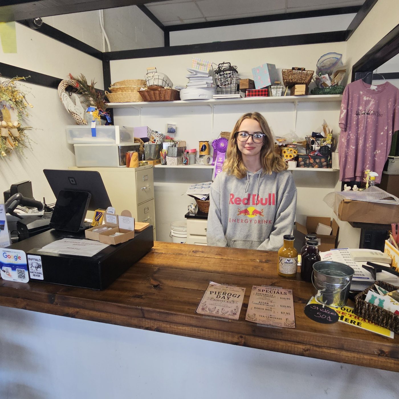 Front register and welcome area of the shop